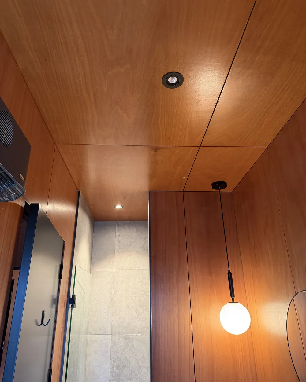 Recoated timber ceiling with pendant lighting in a Wānaka home