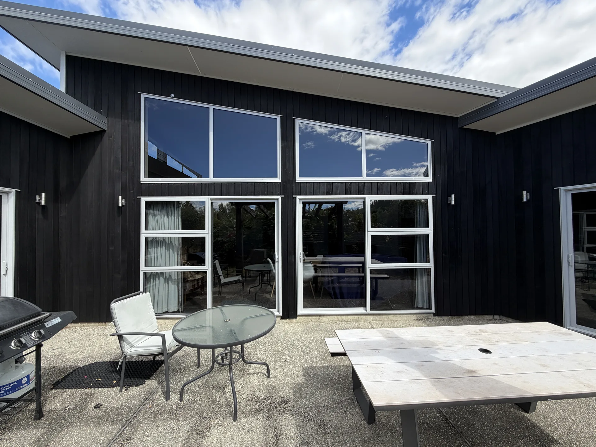 Cedar Exterior Restoration and Stain Refresh in Wānaka - After 1: Cedar Cladding Restoration Complete Rear View Wanaka