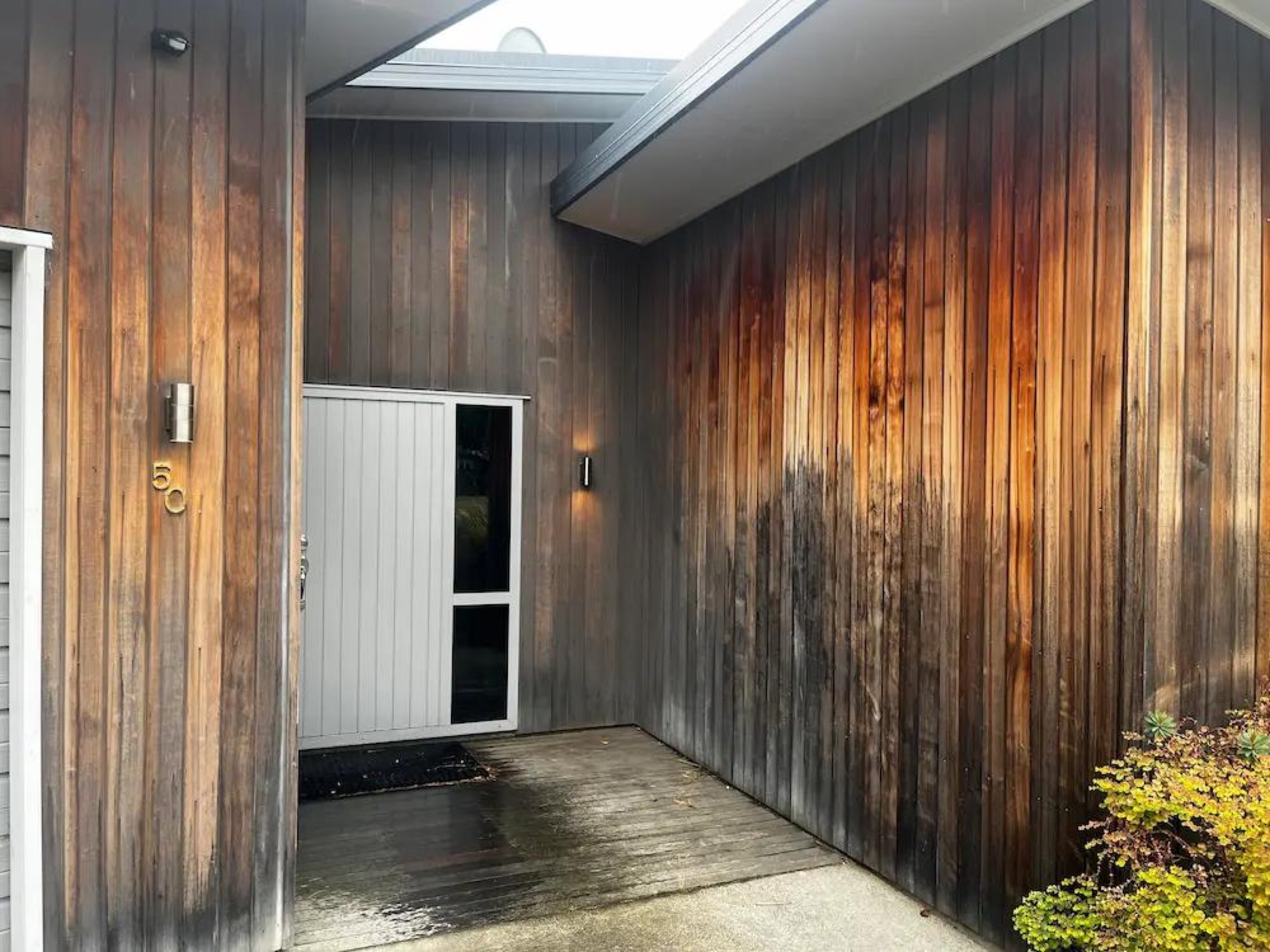 Cedar Exterior Restoration and Stain Refresh in Wānaka - Before 4: Weathered Cedar Cladding Entry Before Staining Albert Town