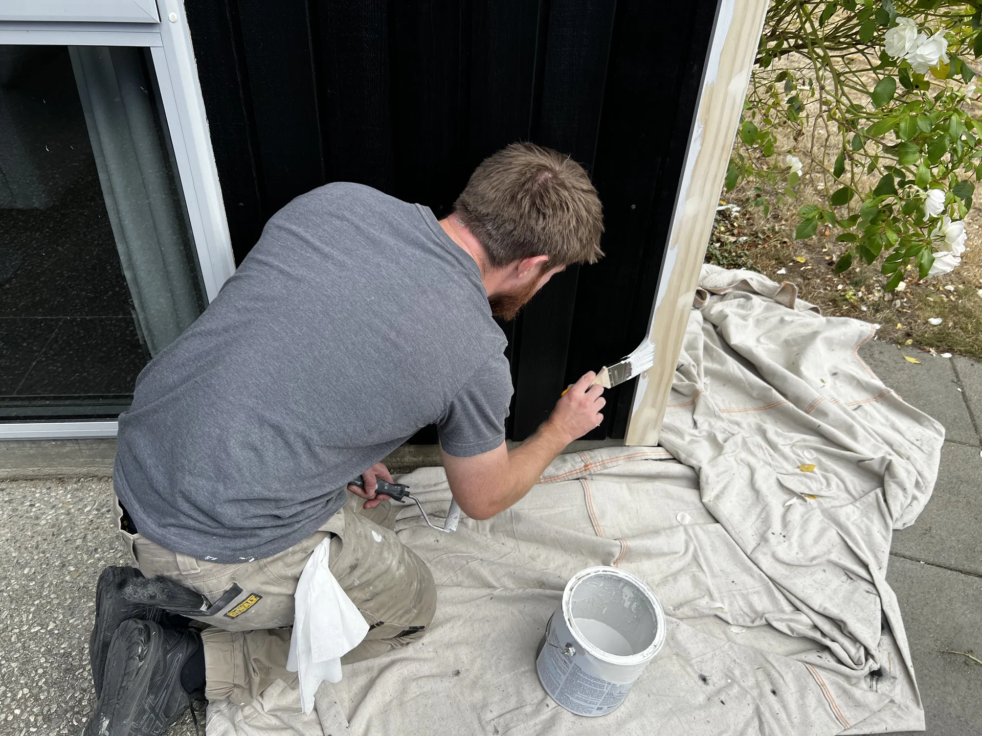 Cedar Exterior Restoration and Stain Refresh in Wānaka - Process 4: Cutting In Window Trims Cedar Exterior Wanaka