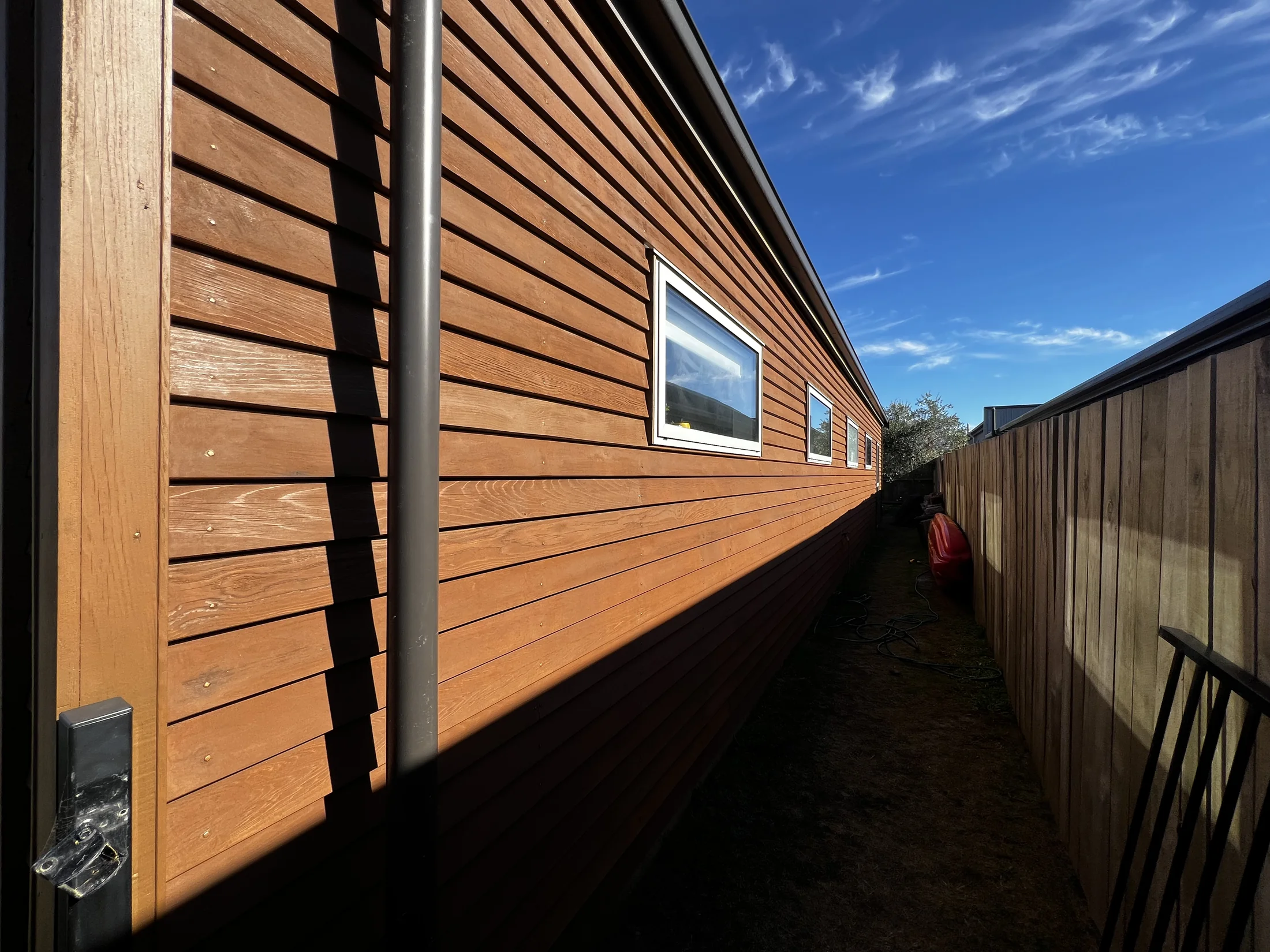 Cedar Maintenance in Northlake, Wānaka - After 4: Restained Cedar Weatherboard Side Elevation Northlake Wanaka