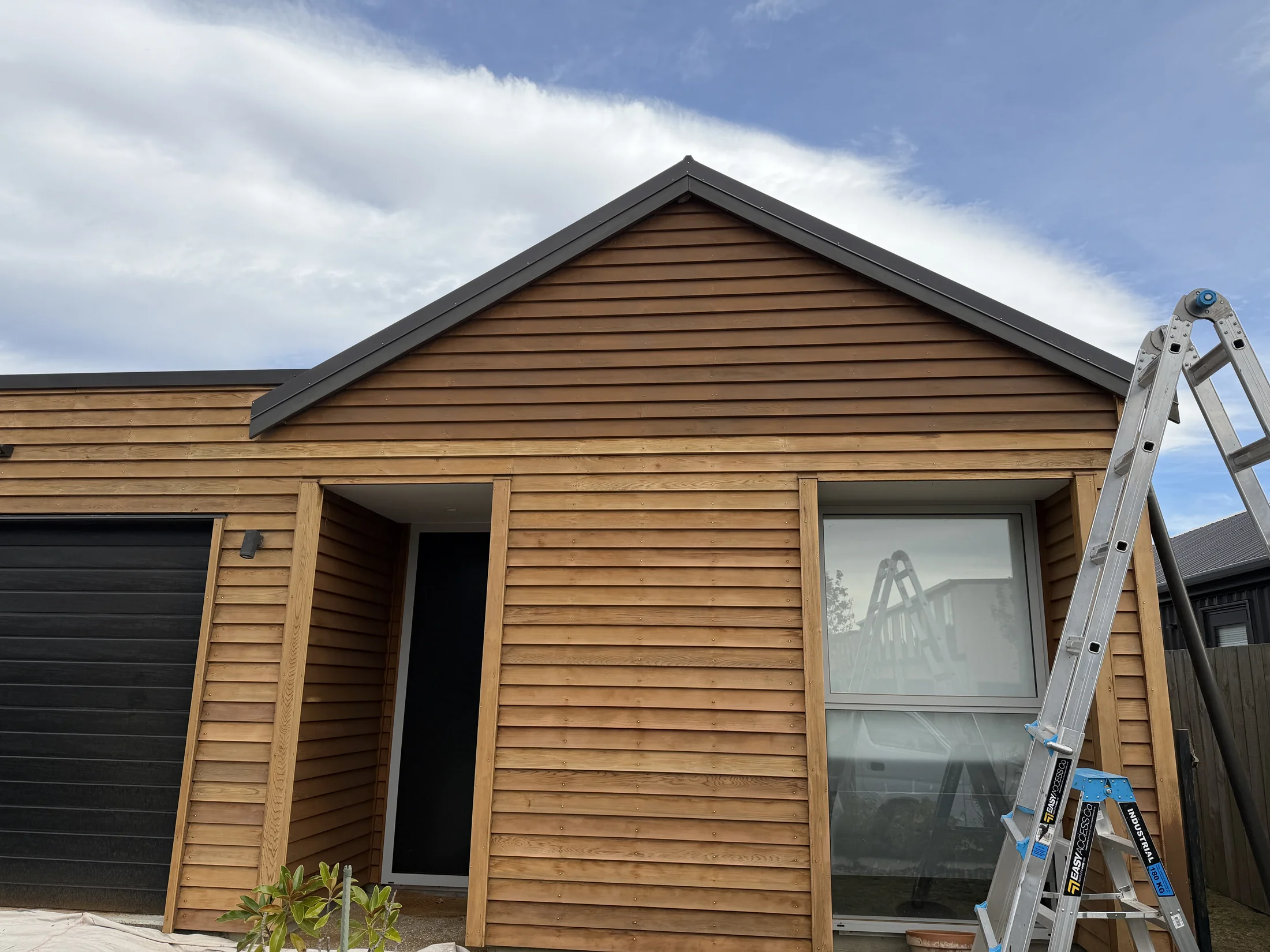 Cedar Maintenance in Northlake, Wānaka - Process 3: Front Elevation Sanded Cedar Mid Staining Northlake Wanaka