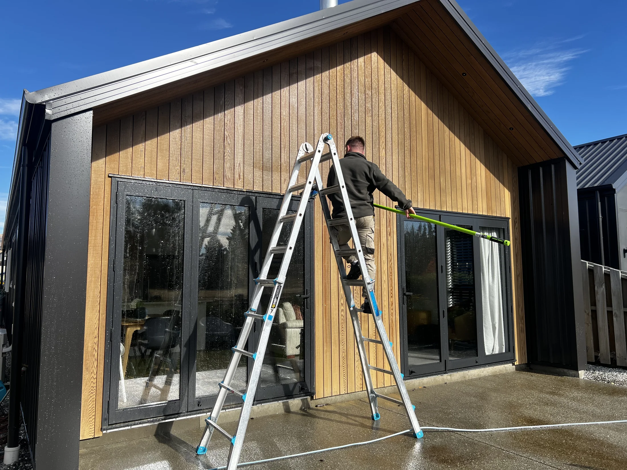 Cedar Oil Refresh in Northlake, Wānaka - Process 5: Washing Cedar Rear Elevation During Prep Northlake Wanaka