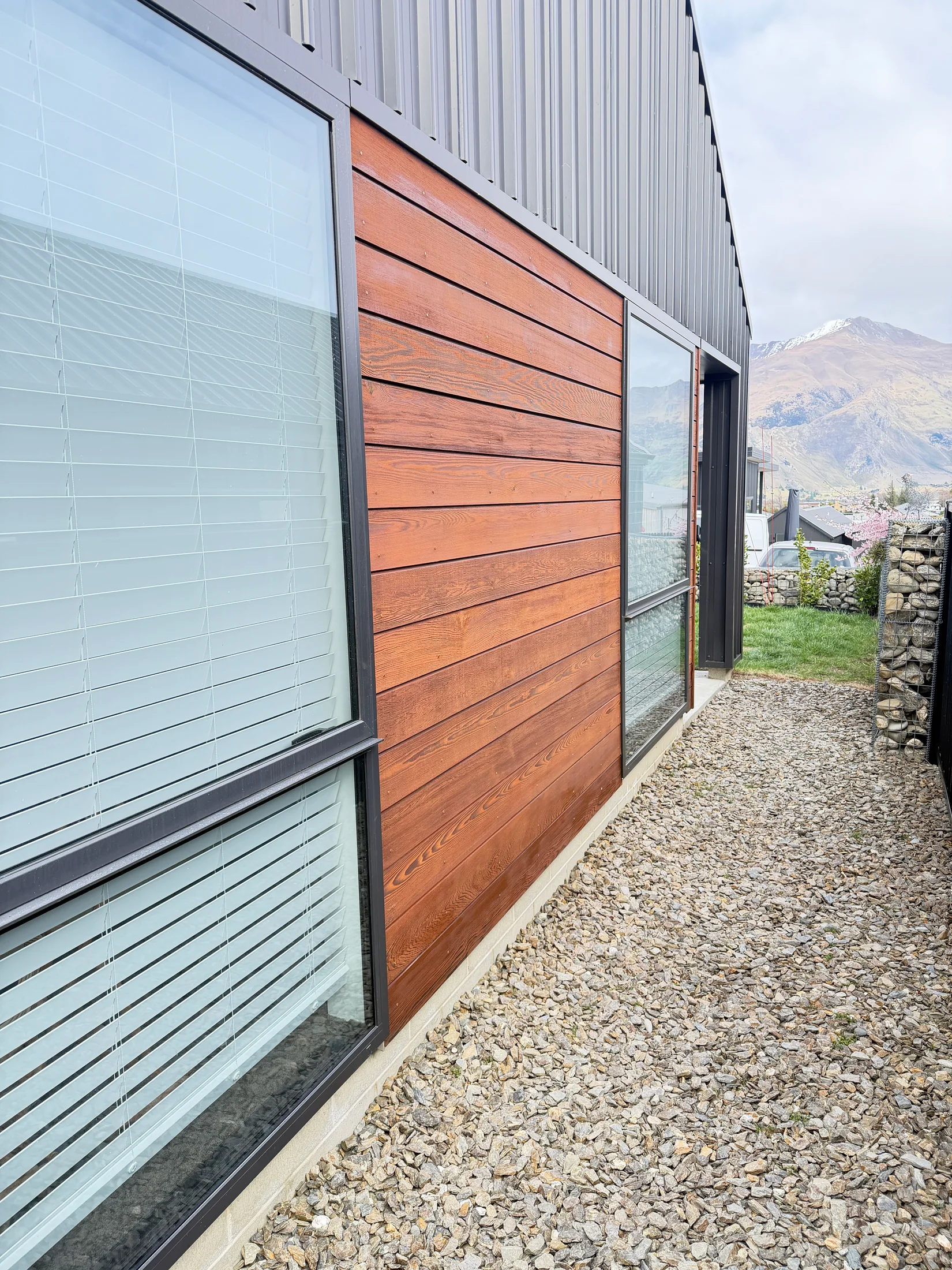 Cedar side cladding after cleaning, brightening and Dryden WoodOil in Wānaka