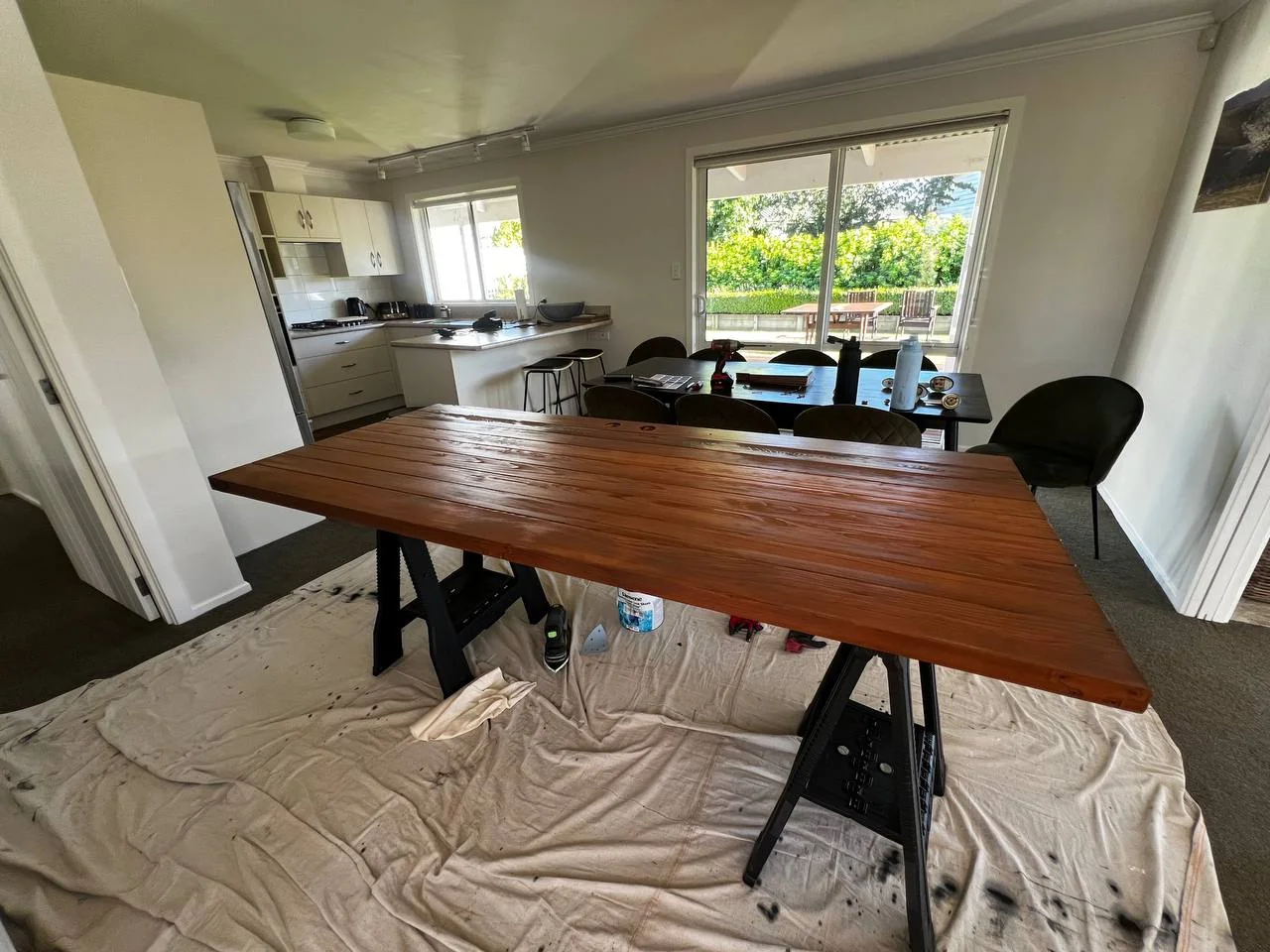 Exterior Repaint & Deck Stain, Albert Town - Process 2: Dining Table Freshly Restained Drop Sheets Albert Town