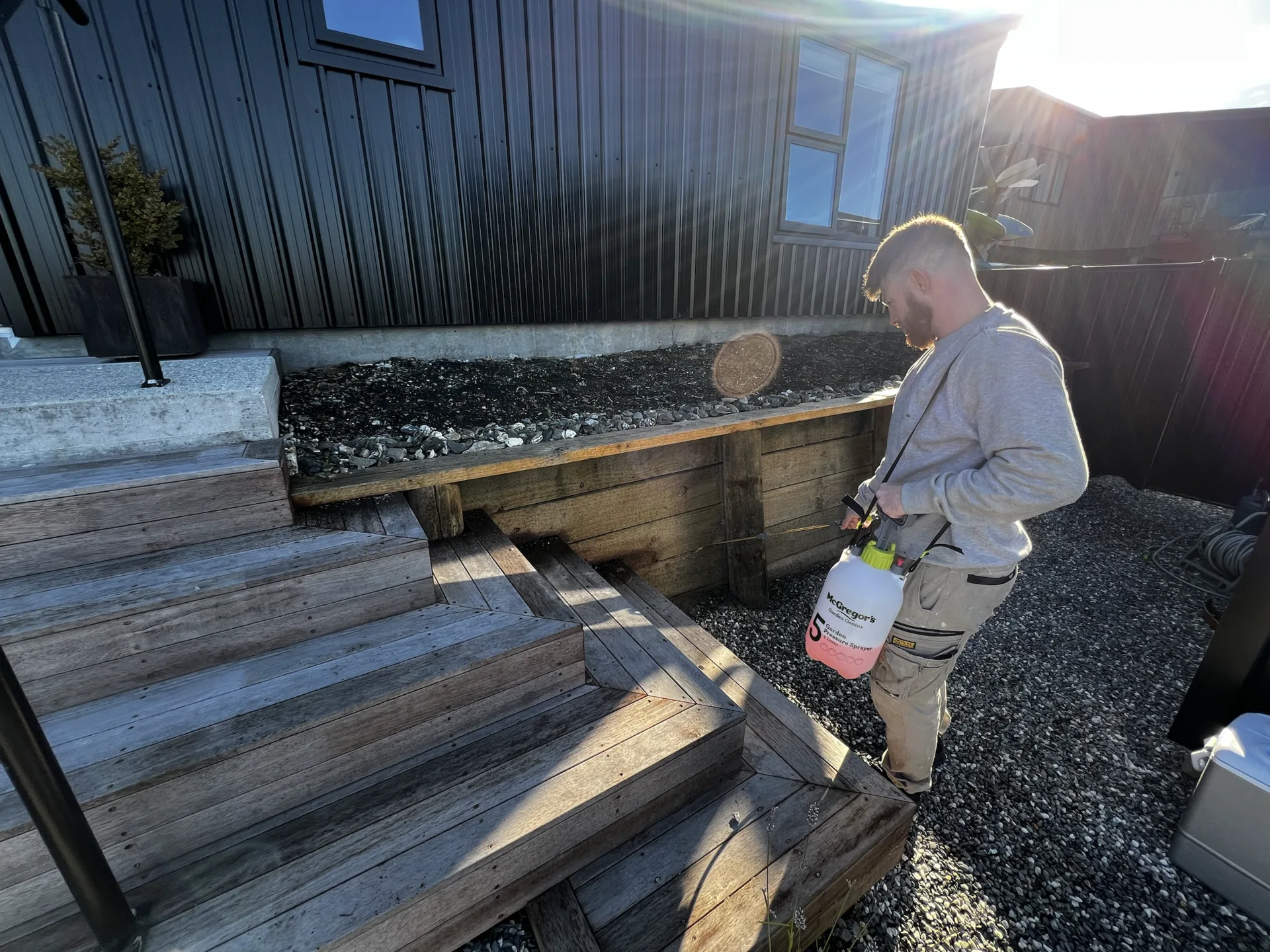 Retaining Wall Repaint in Lake Hawea - Process 1: Applying Cleaning Solution In Lake Hawea