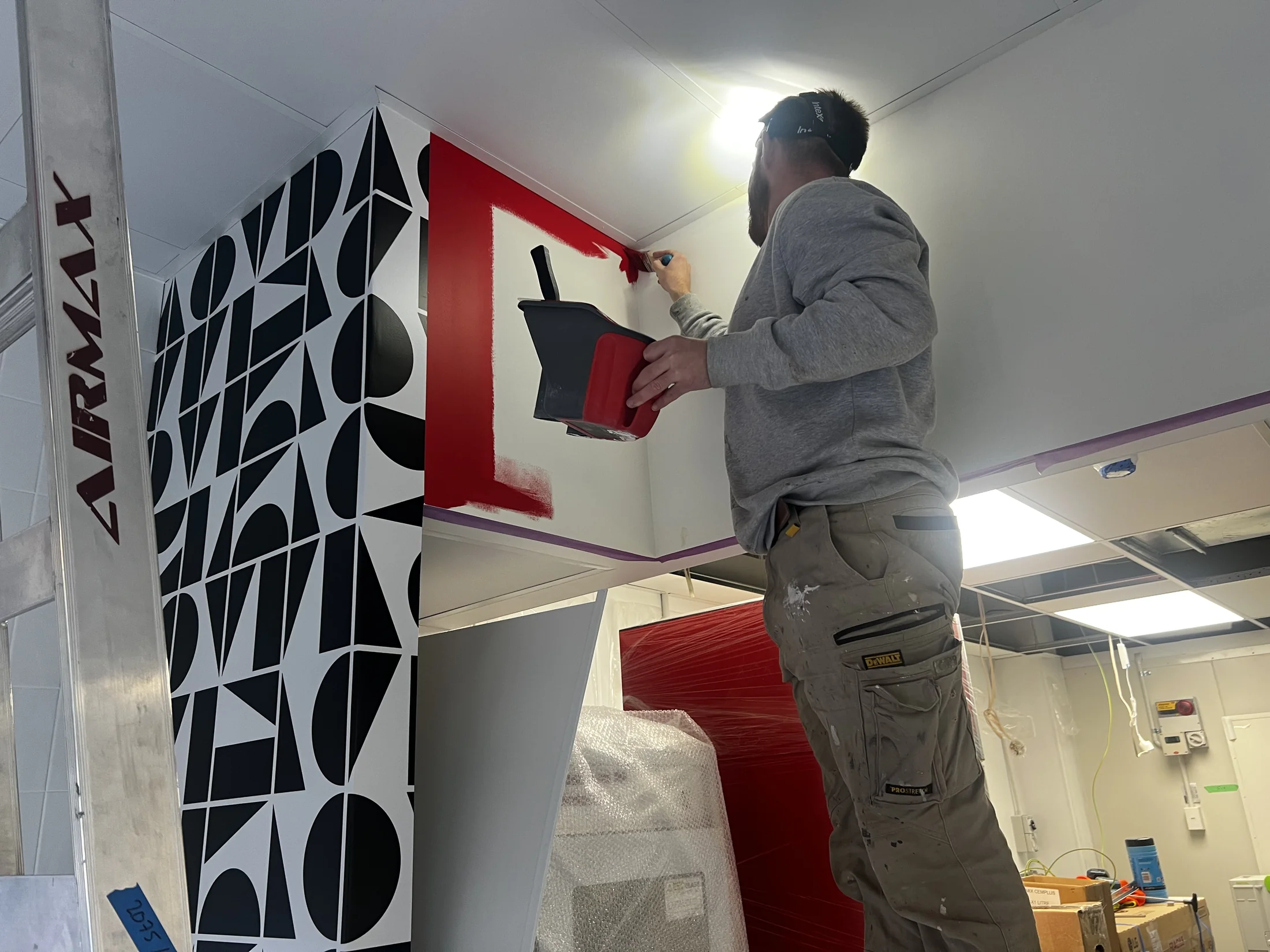 Pizza Hut Fitout, Wanaka - Process 2: Painting Pizza Hut Red Brand Colour Feature Wall Wanaka