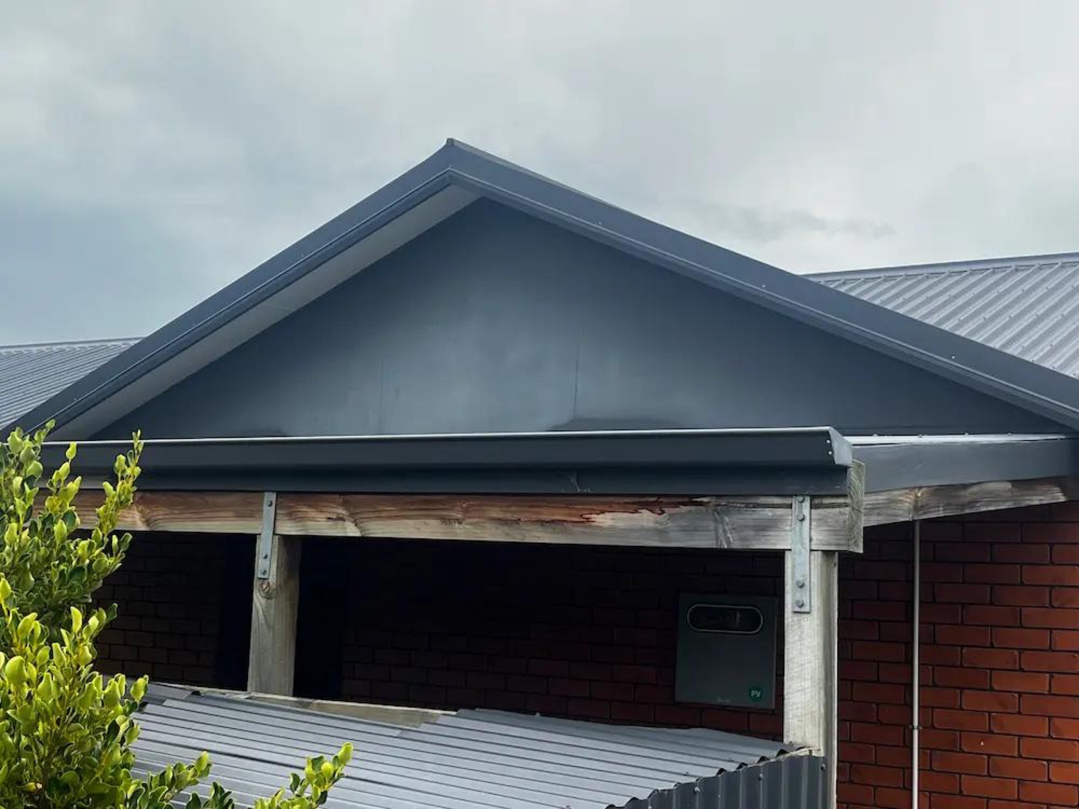 Repaint of Gables in Wanaka - Before 3: Weathered Gable Fibre Cement Before Restoration Wanaka