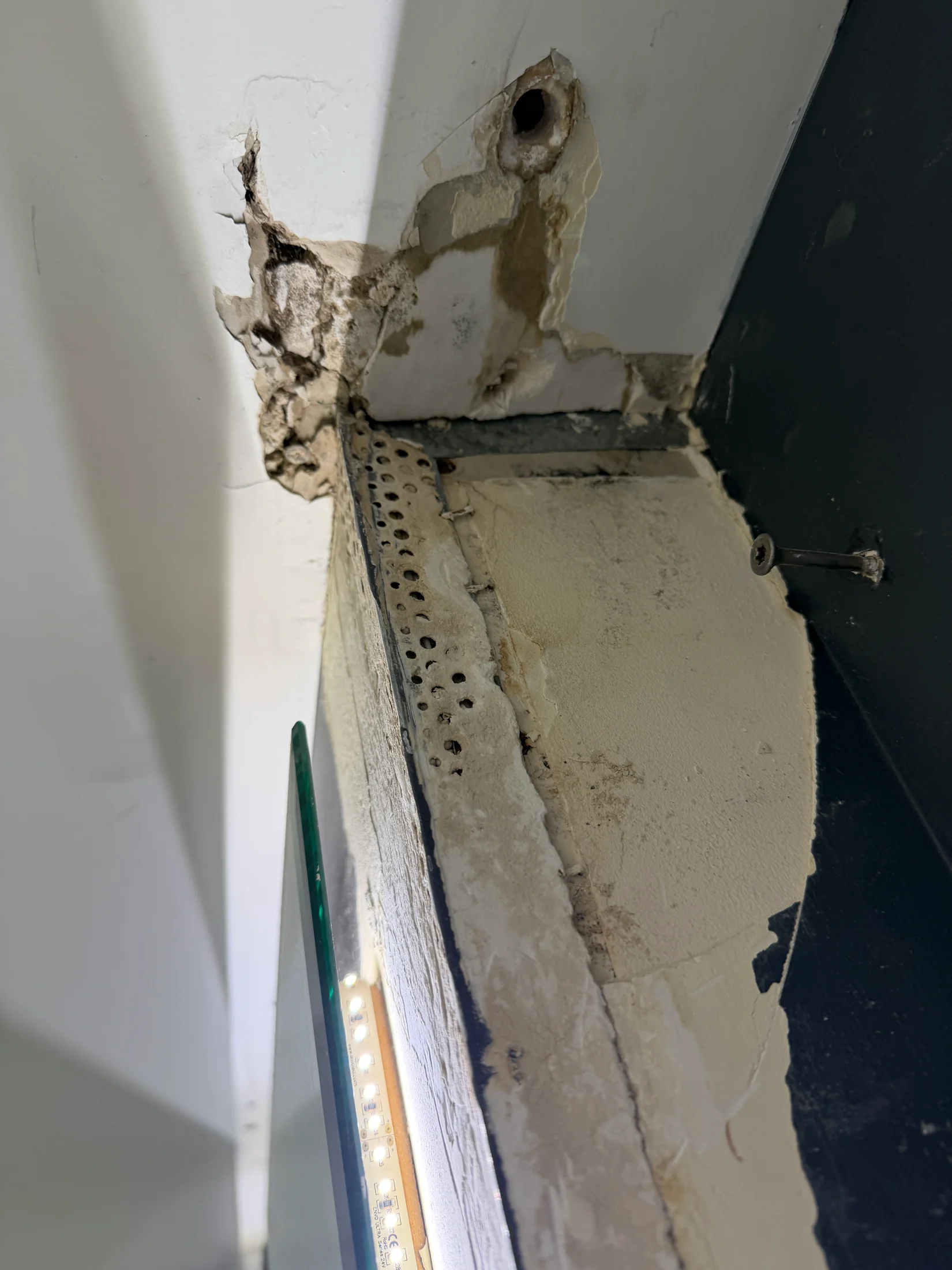 Rodd & Gunn Store Painting, Wanaka - Before 1: Damaged Door Frame Before Repair Wanaka